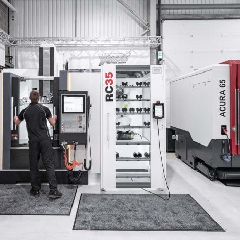YCM NFX 400A and Hedelius Acura 65 CNC machines at YMT Technologies showroom.
