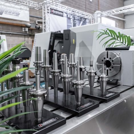 CNC tool holders and rotary table display at YMT Technologies showroom.